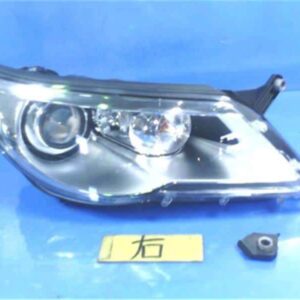 Right Headlight VOLKSWAGEN Tiguan 2010 ABA-5NCAW